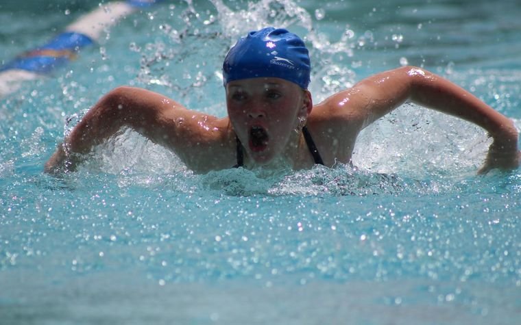 Simba pupil competing in swimming